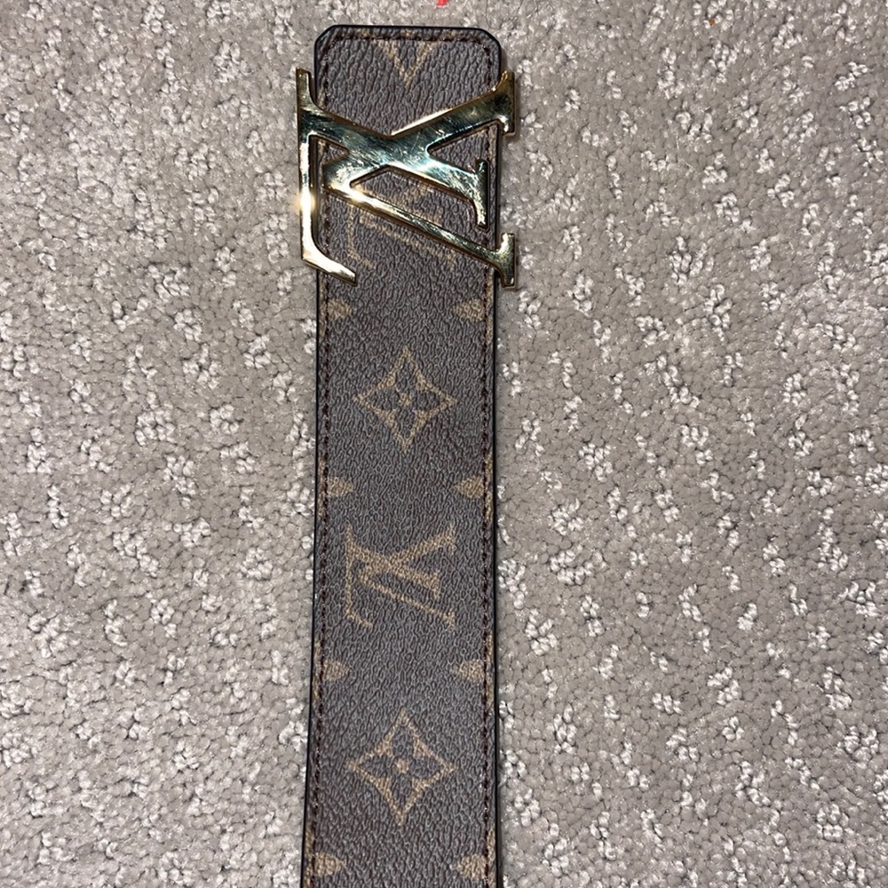 Man’s reversible brown and black with gold Louis Vuitton belt